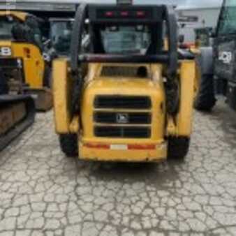 Cargadores compactas 1999 John Deere 240 (3)