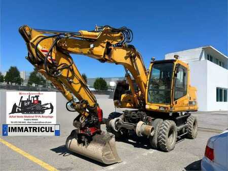 Escavadora de rodas 2006 Hyundai ROBEX 140W-7 (1)
