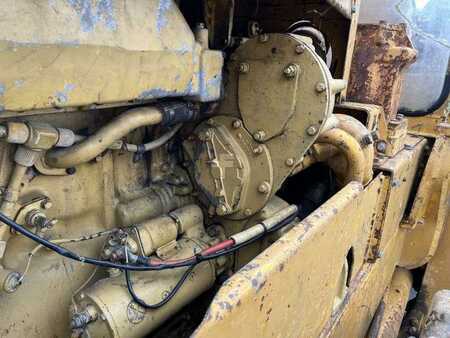 Caterpillar 825 + porte engins