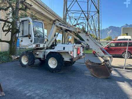 Escavadora de rodas 1993 Mecalac 8CXI (1)