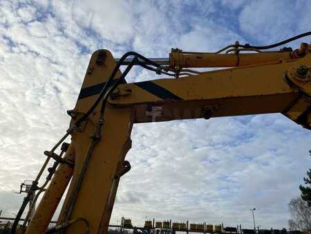 Pelle sur pneus 1982 Poclain P60 (20)