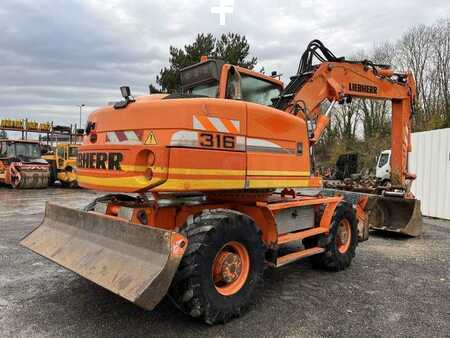 Excavadoras de ruedas 2010 Liebherr A316 LITRONIC (6)