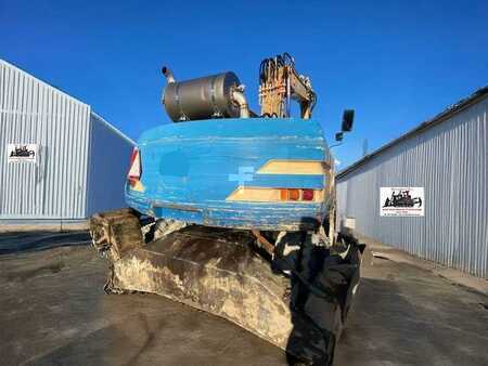 Kerekes kotrógép 1996 Caterpillar M315 (10)