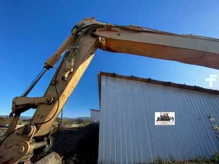 Kerekes kotrógép 1996 Caterpillar M315 (11)