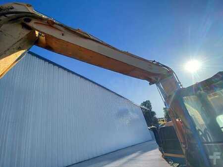 Kerekes kotrógép 1996 Caterpillar M315 (12)