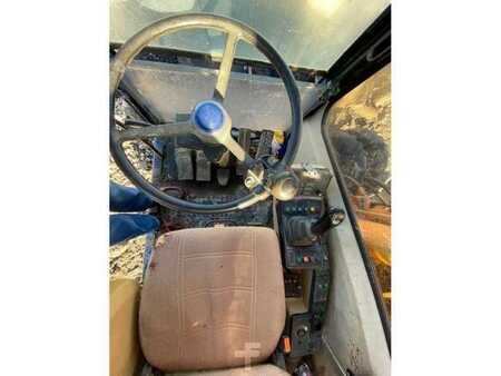 Kerekes kotrógép 1996 Caterpillar M315 (27)