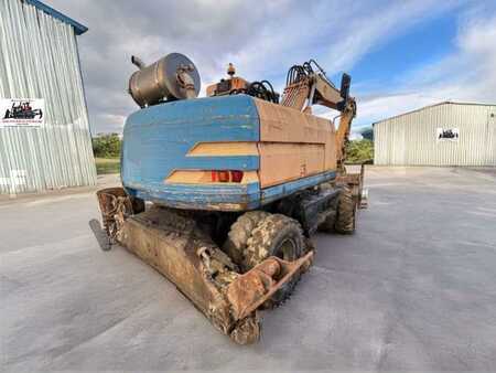 Kerekes kotrógép 1996 Caterpillar M315 (8)