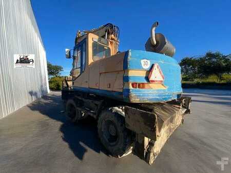 Kerekes kotrógép 1996 Caterpillar M315 (9)