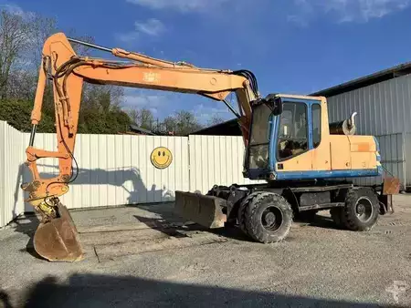 Escavatori gommati 1997 Caterpillar M315 (1)