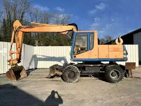 Escavatori gommati 1997 Caterpillar M315 (3)