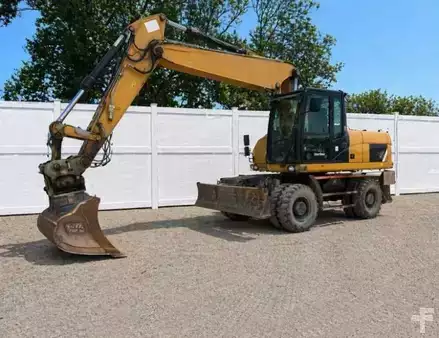 Mobilní bagry 2014 Caterpillar M318D DE LUXE (1)