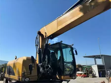 Mobilní bagry 2014 Caterpillar M318D DE LUXE (47)