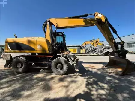Mobilní bagry 2014 Caterpillar M318D DE LUXE (9)