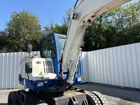 Pelle sur pneus 2014 Doosan DX55W (12)