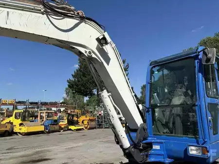 Pelle sur pneus 2014 Doosan DX55W (13)