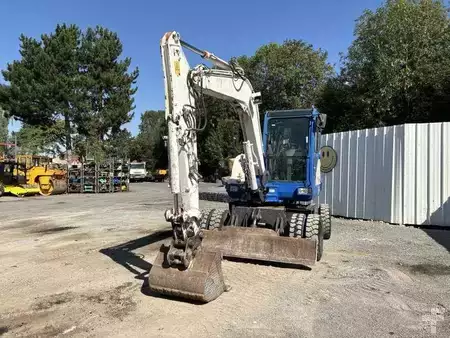 Pelle sur pneus 2014 Doosan DX55W (16)