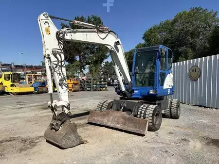 Pelle sur pneus 2014 Doosan DX55W (17)