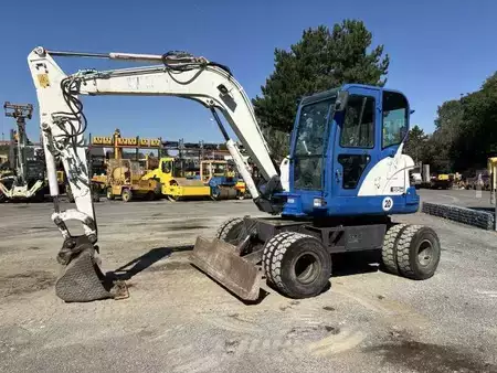 Pelle sur pneus 2014 Doosan DX55W (18)