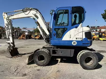 Pelle sur pneus 2014 Doosan DX55W (19)