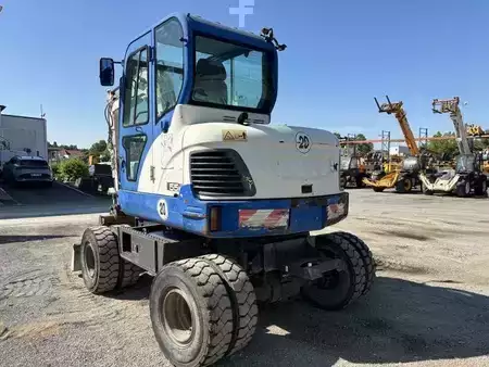 Pelle sur pneus 2014 Doosan DX55W (21)