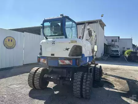 Pelle sur pneus 2014 Doosan DX55W (23)