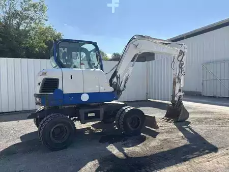 Pelle sur pneus 2014 Doosan DX55W (25)