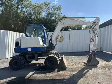 Pelle sur pneus 2014 Doosan DX55W (26)