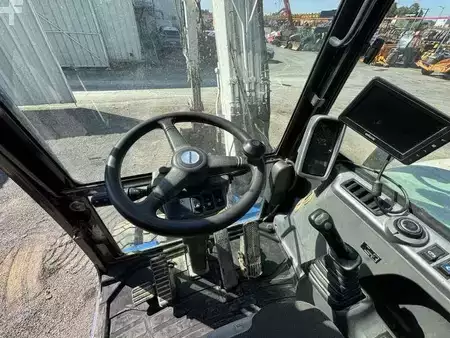 Pelle sur pneus 2014 Doosan DX55W (27)