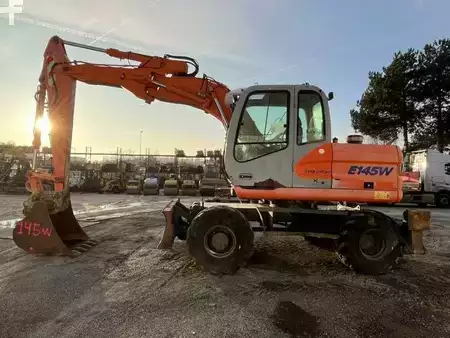 Escavatori gommati 2004 Fiat-Kobelco E145W (4)