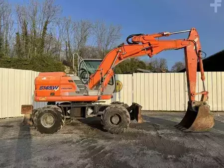 Escavatori gommati 2004 Fiat-Kobelco E145W (7)