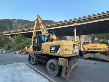 Překládací bagry  2012 Caterpillar M322DMH (11)