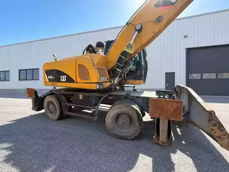 Koparki chwytakowe 2014 Caterpillar M318DMH (10)