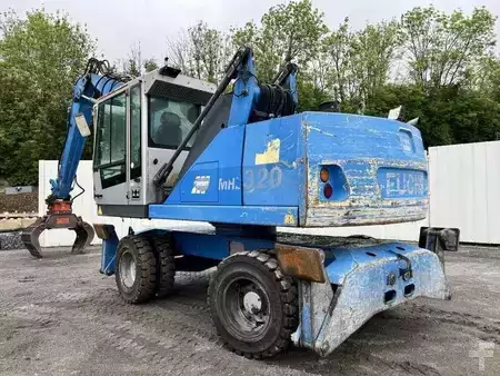 Překládací bagry  2010 Fuchs MHL 320 (8)