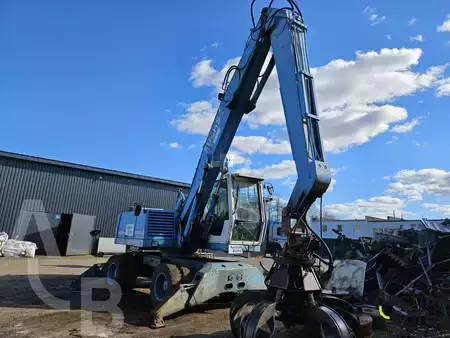 Escavatori gommati 2001 Fuchs MHL 320 (2)